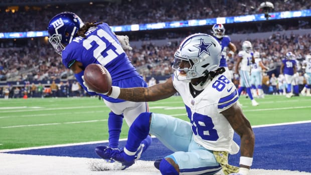 Nov 12, 2023; Arlington, Texas, USA; Dallas Cowboys wide receiver CeeDee Lamb (88) makes a touchdown catch past New York Giants safety Bobby McCain (21) during the second half at AT&T Stadium.